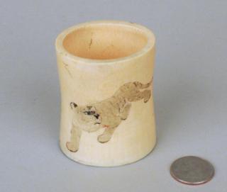 Appraisal: Japanese Ivory Cup Incised Tiger Motif Japanese ivory cup with