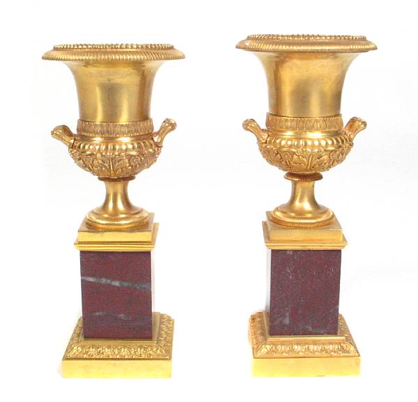 Appraisal: A pair of Empire style gilt bronze and marble urns