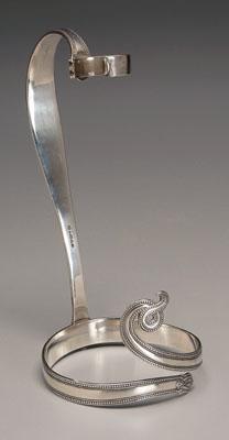 Appraisal: Silver plate wine bottle holder scroll form with beaded border