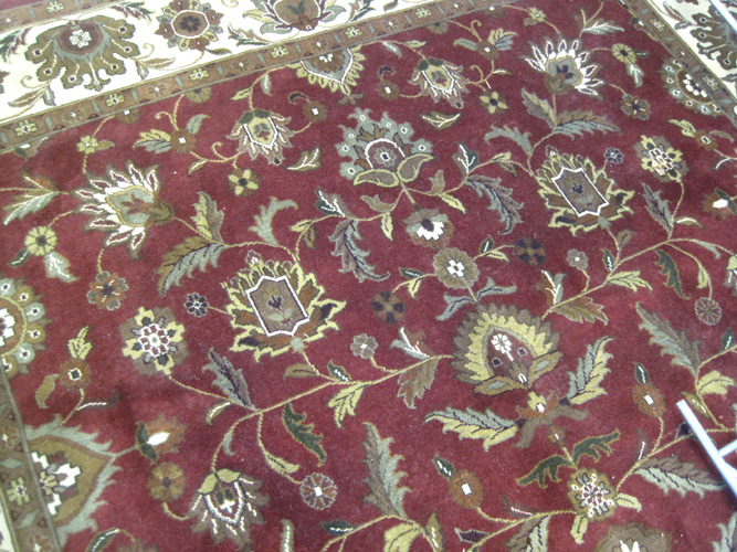 Appraisal: CONTEMPORARY HAND KNOTTED ORIENTAL CARPET Indo-Persian overall floral decoration on