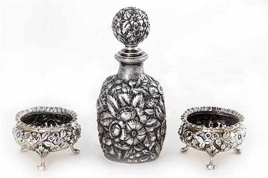 Appraisal: American sterling repousse bottle and pair of salts Dominick Haff