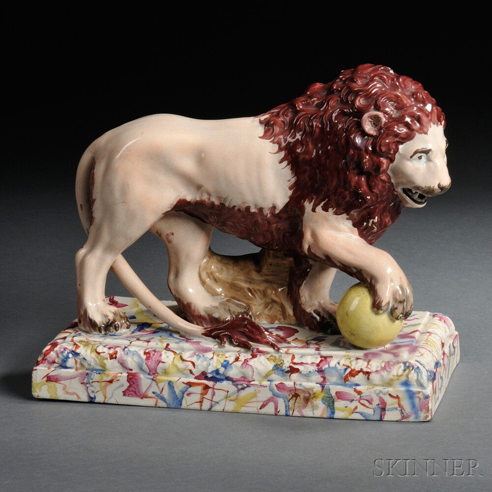 Appraisal: Staffordshire Pottery Model of a Lion England early th century