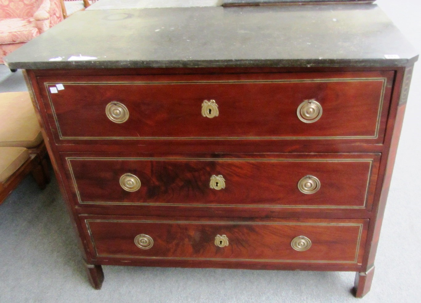 Appraisal: A th century French brass inlaid mahogany commode the canted