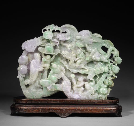 Appraisal: ELABORATE JADEITE GROUP Elaborately carved Chinese jadeite group depicting scene