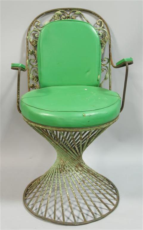 Appraisal: WROUGHT IRON SALON VANITY CHAIR th century the arched back