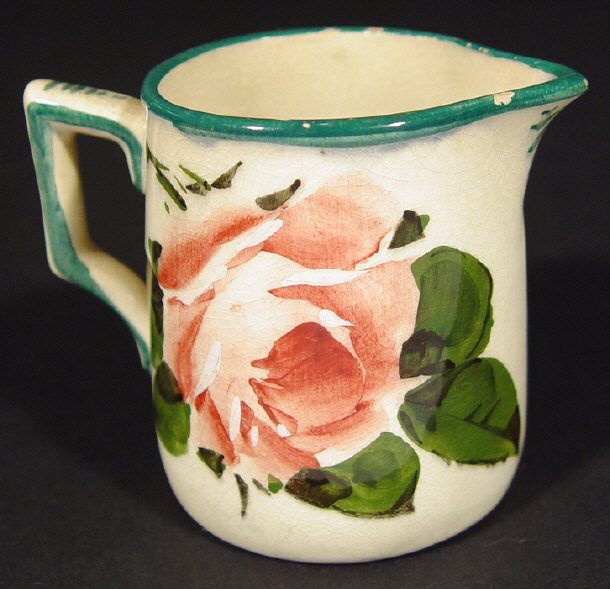 Appraisal: Wemyss cream jug hand painted with pink roses impressed factory