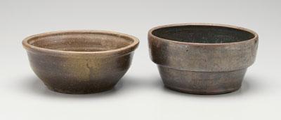 Appraisal: Two Georgia stoneware bowls one with rolled and flattened rim