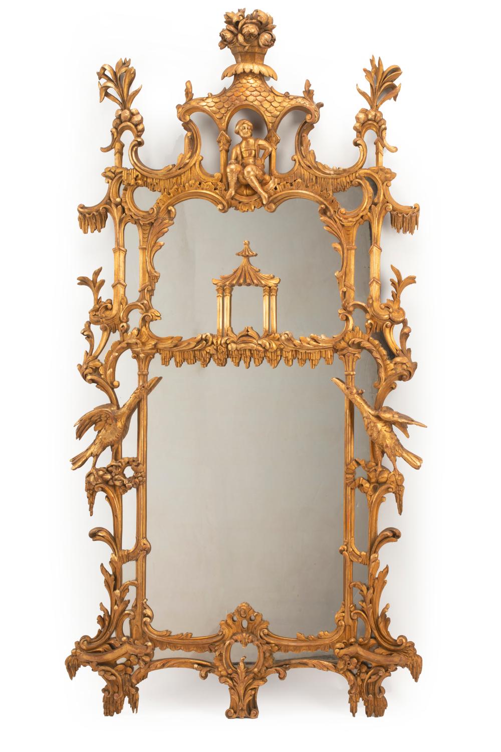 Appraisal: Chinese Chippendale-Style Carved Giltwood Mirror floral pagoda crest centered by