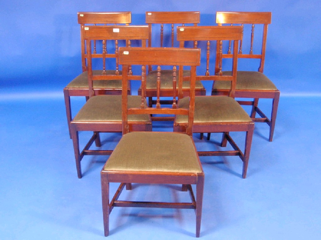 Appraisal: A set of six Georgian mahogany dining chairs with ebony