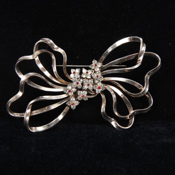 Appraisal: Pennino Sterling Giant Flowers and Golden Bow Pin Loss to