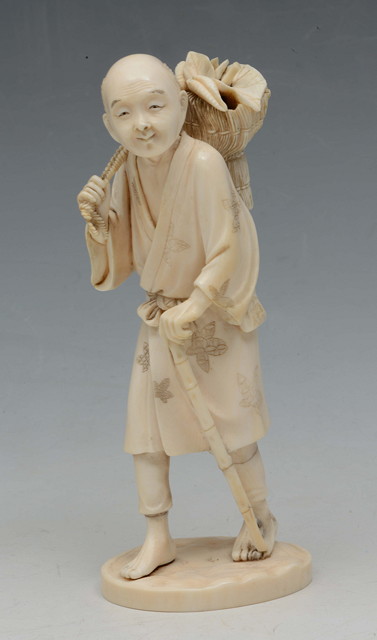 Appraisal: A JAPANESE IVORY OKIMONO in the form of a farmer