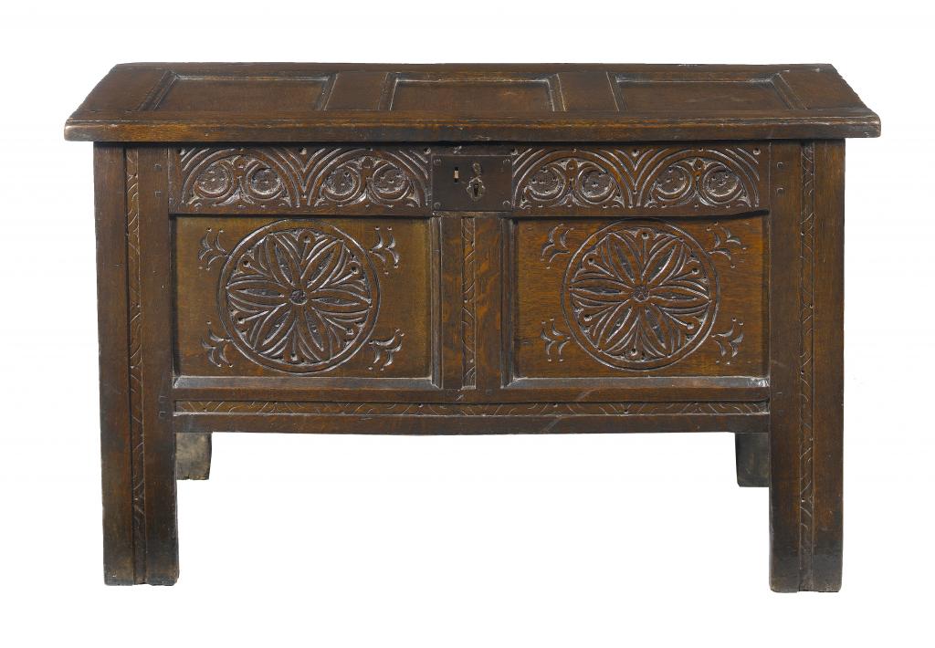 Appraisal: A JOINED OAK CHEST with triple panelled lid the twin