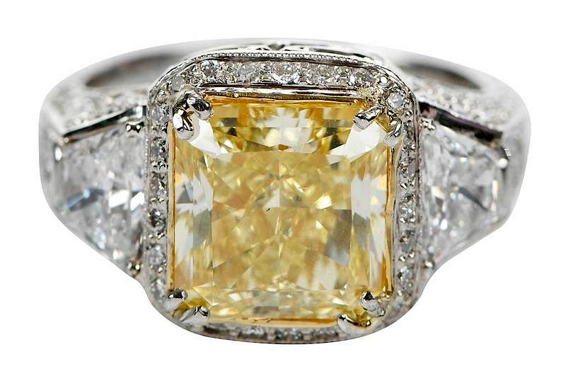 Appraisal: ct Fancy Yellow Diamond Ring center radiant brilliant cut diamond