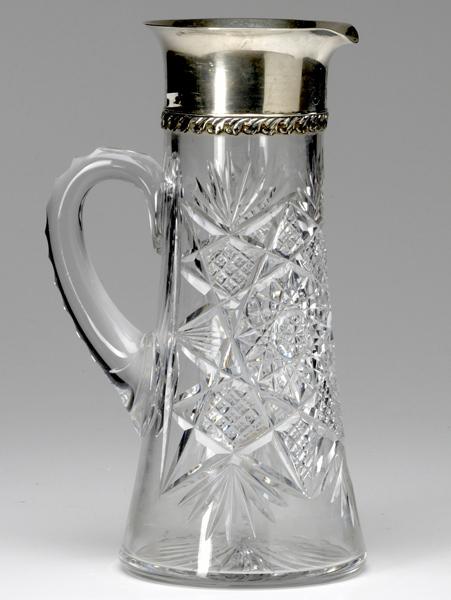 Appraisal: TIFFANY CO Sterling mounted cut glass pitcher monogram at rim