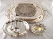 Appraisal: A quantity of silver plate including a bonbon dish three