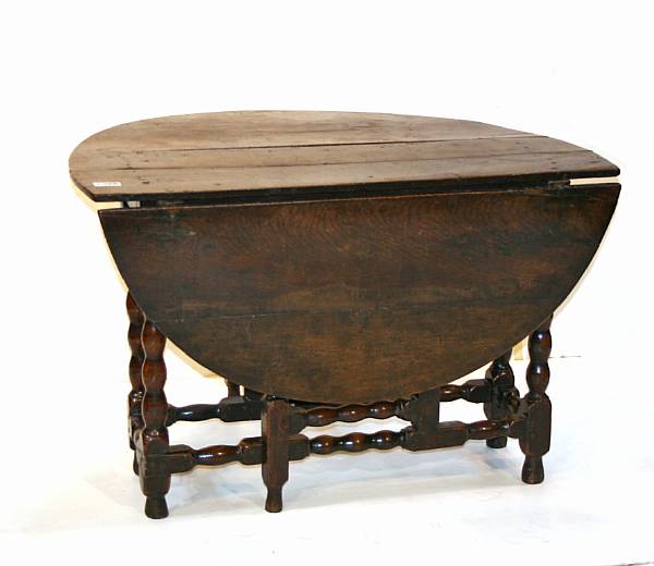 Appraisal: A Charles II oak drop-leaf table late th century height