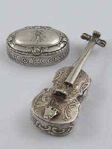 Appraisal: A silver pill box in the form of a violin