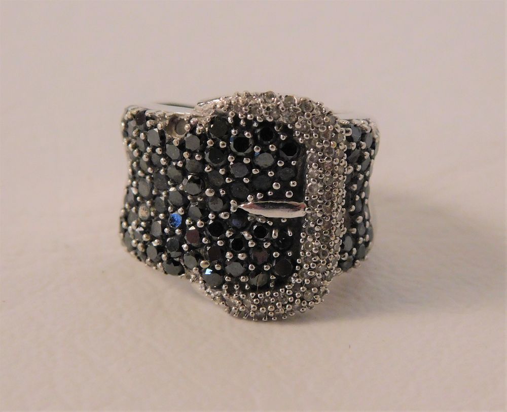 Appraisal: BLACK DIAMONDS GOLD BUCKLE RING k white gold buckle-form ladies