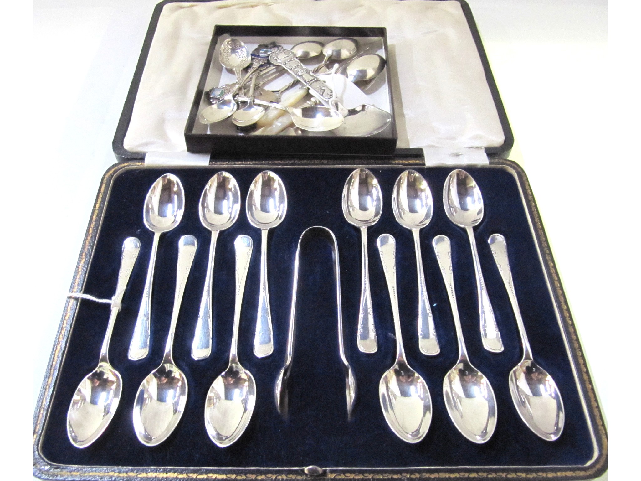 Appraisal: A lot comprising a cased set of twelve EP spoons