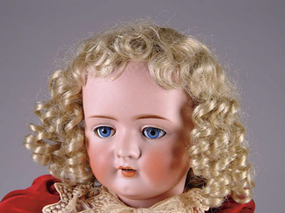 Appraisal: BRUNO SCHMIDT BISQUE DOLL This beautiful doll with blue sleep