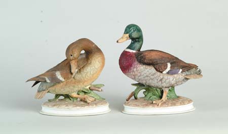 Appraisal: PAIR OF PORCELAIN DUCK FIGURINES th Century Male and female