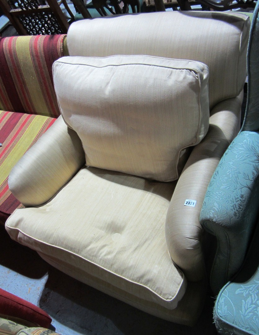 Appraisal: A th century gold upholstered Howard style armchair