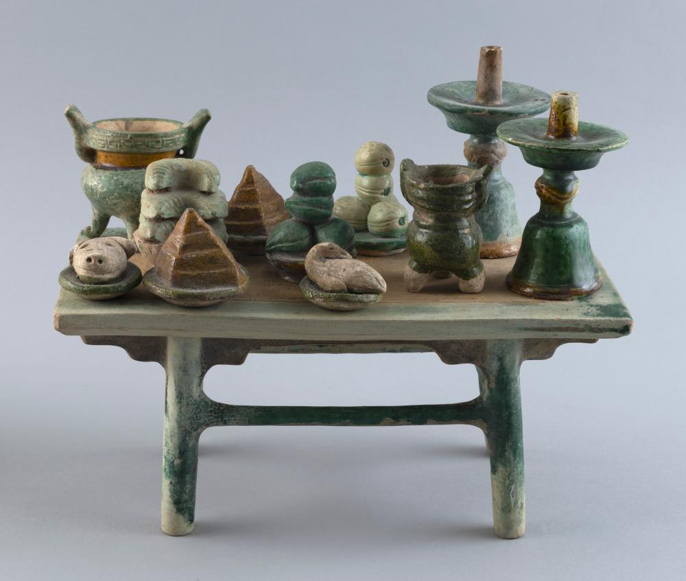 Appraisal: CHINESE SANCAI GLAZE EARTHENWARE ALTAR TABLE AND ELEVEN ASSORTED OFFERINGS