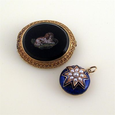 Appraisal: A Victorian micro-mosaic brooch Depicting a recumbent spaniel and in