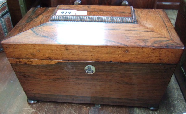 Appraisal: A th century rosewood sarcophagus shaped tea caddy with a