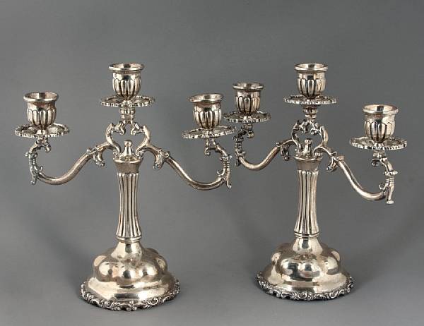 Appraisal: A pair of Mexican sterling three light candelabra oz dwts