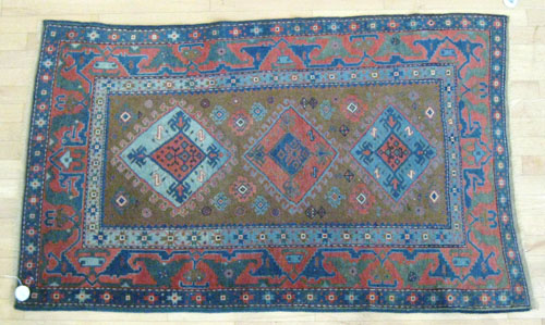 Appraisal: Caucasian carpet early th c with three medallions on an