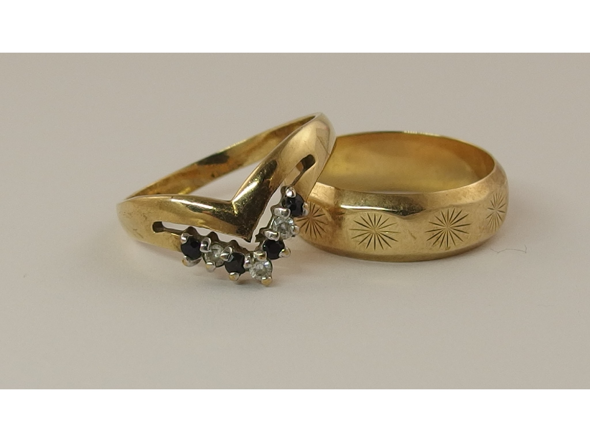 Appraisal: A ct retro wedding ring together with a ct gem