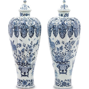 Appraisal: A Pair of Delft Covered Vases th Century each with