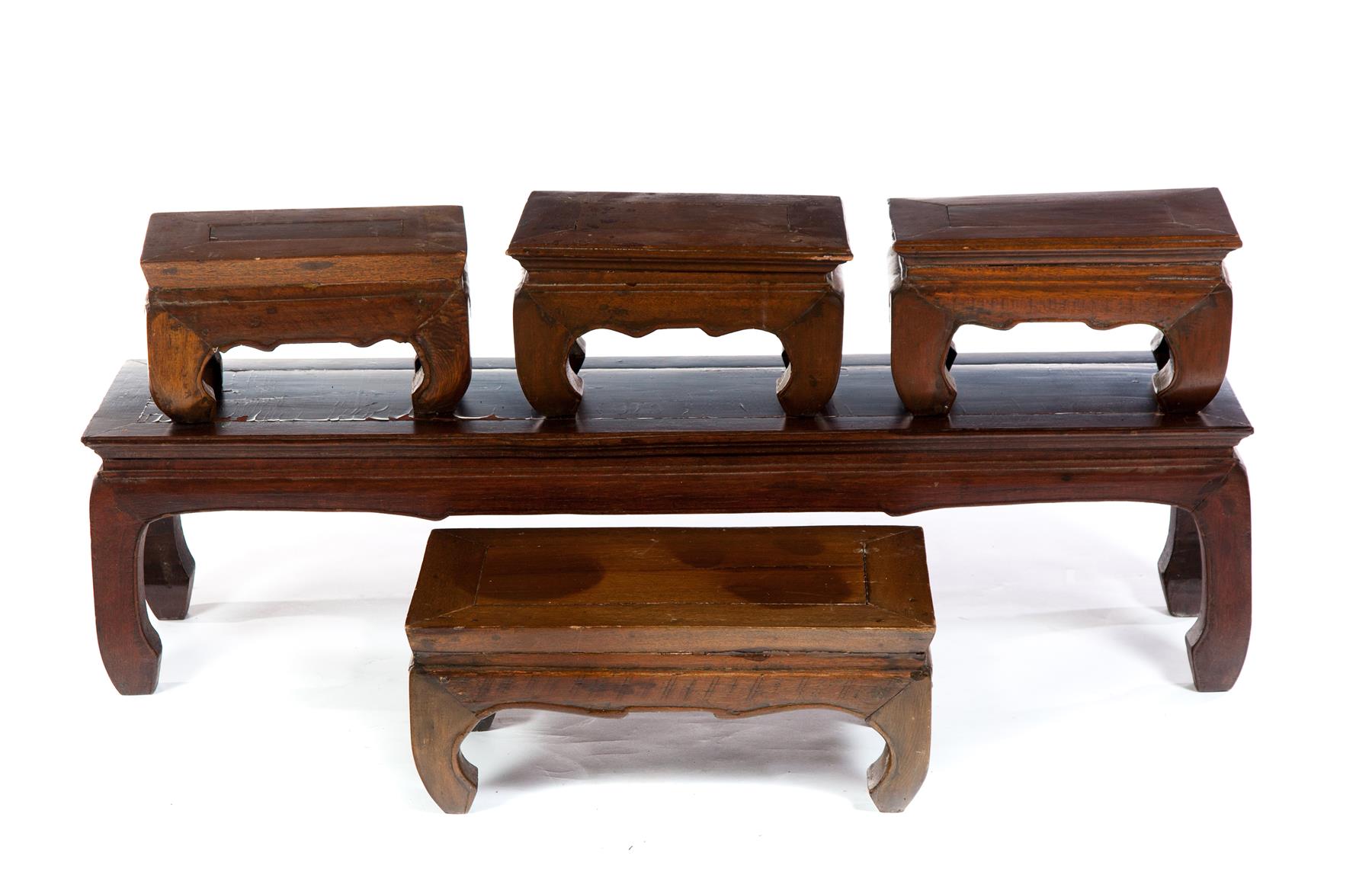 Appraisal: FIVE ASIAN STACKING TABLES Late th century Low hardwood tables