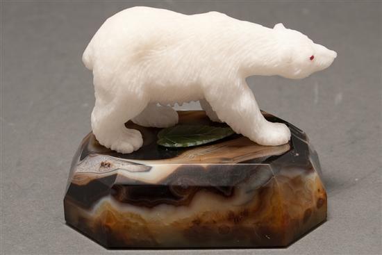 Appraisal: Carved hardstone polar bear figure with carved agate base figure