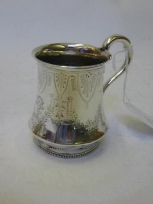 Appraisal: A VICTORIAN CHRISTENING MUG Birmingham of waisted form chased with