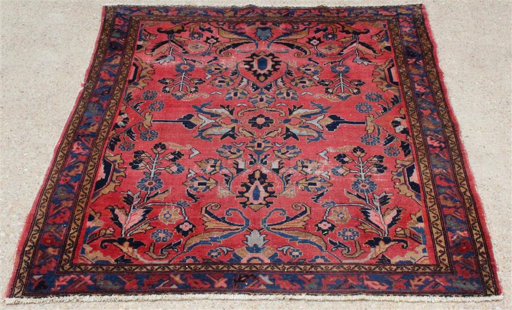 Appraisal: PALMETTE AND FLORAL DESIGN ORIENTAL WOOL RUG floral design on