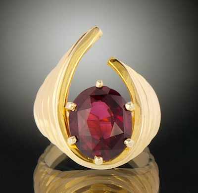 Appraisal: A Ladies' Contemporary Design Garnet Ring k yellow gold asymmetrical