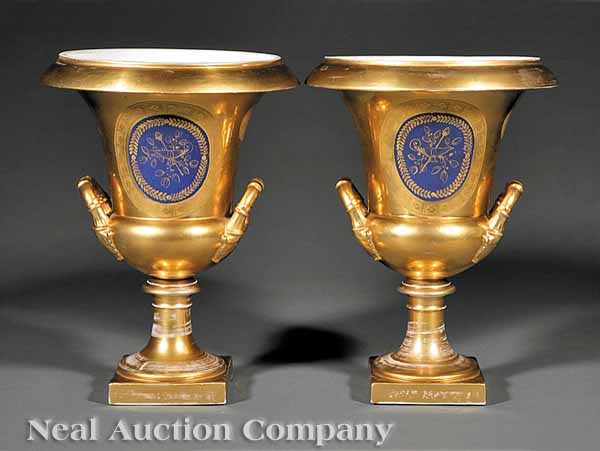 Appraisal: A Pair of Paris Porcelain Gilt-Decorated Campagna Urns th c