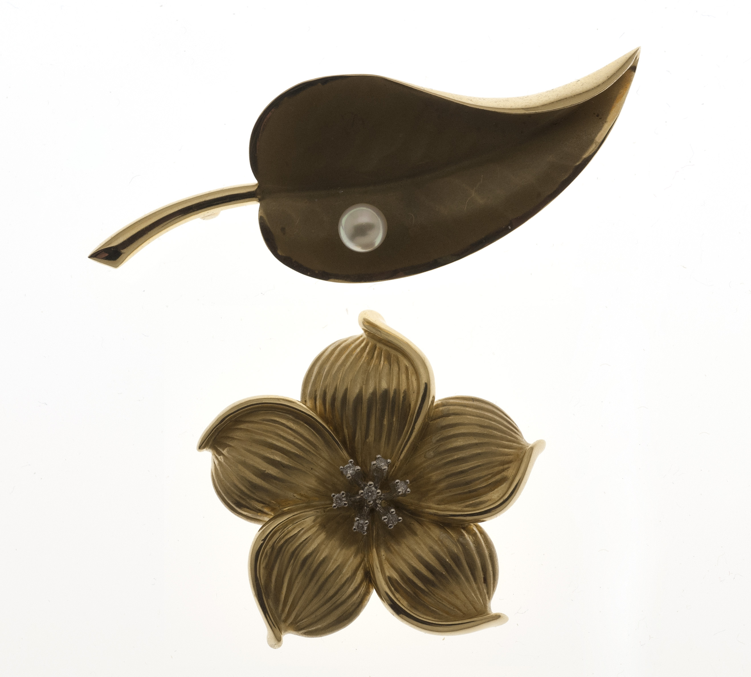 Appraisal: TWO KT GOLD BROOCHES One retailed by Black Starr Gorham