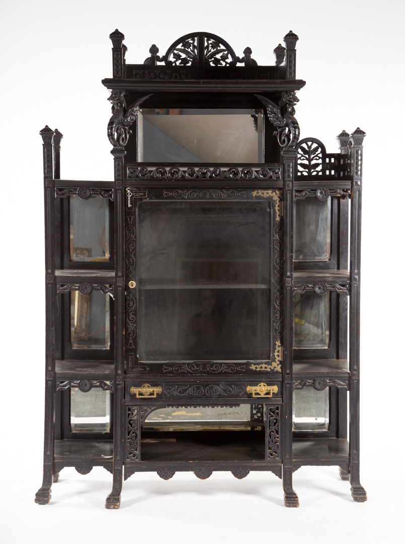 Appraisal: Aesthetic Movement ebonized wood etagere circa multiple shelves some with