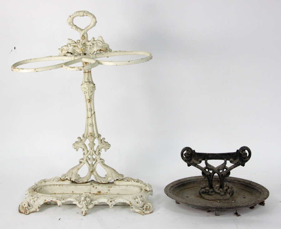 Appraisal: A cast iron umbrella stand and a cast iron boot