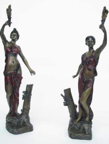 Appraisal: A pair of classical figural torchieres made of patinated and