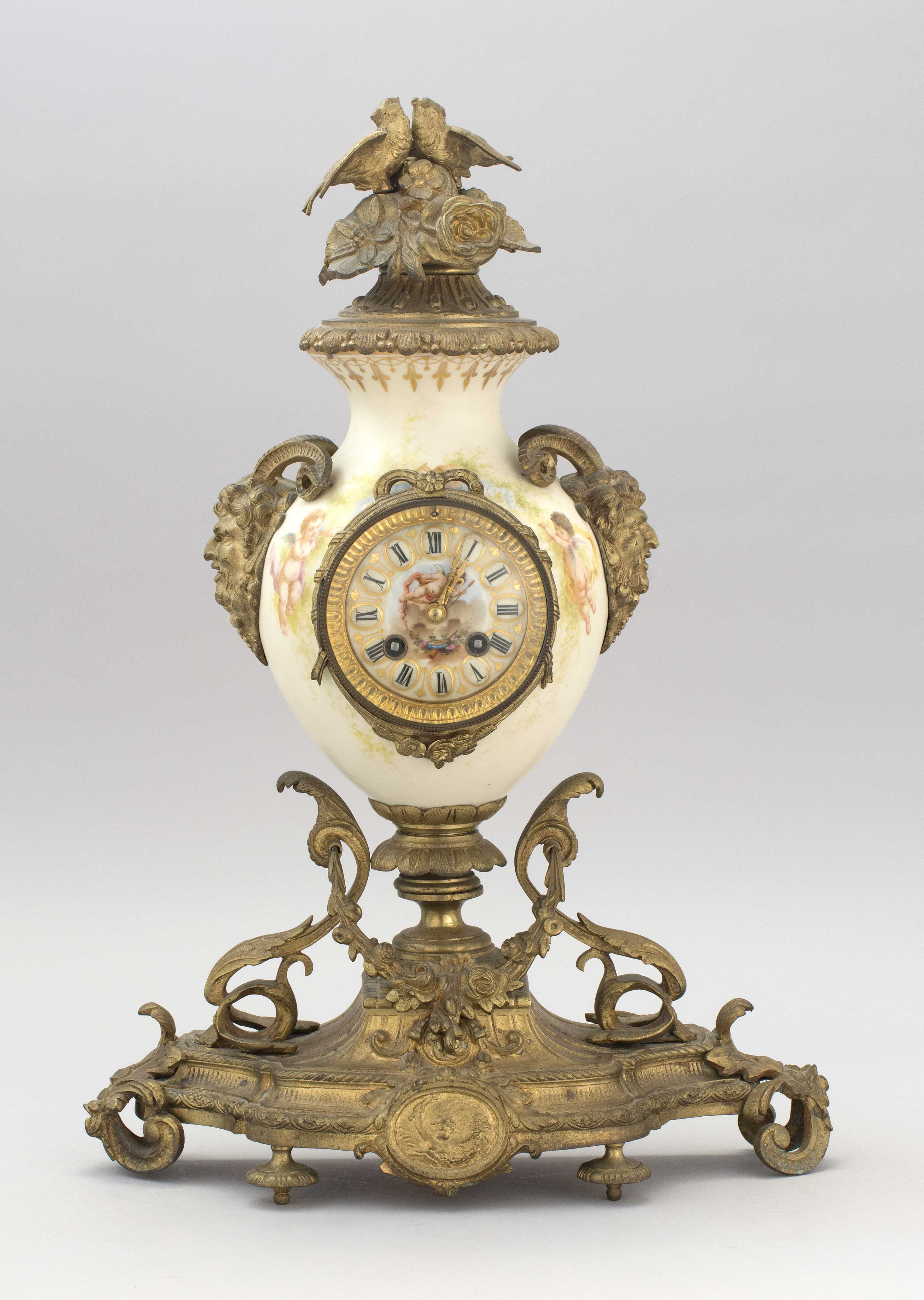 Appraisal: FRENCH PORCELAIN MANTEL CLOCK Early th CenturyWith gold pot metal