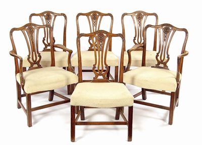 Appraisal: A set of six George III carved mahogany dining chairs