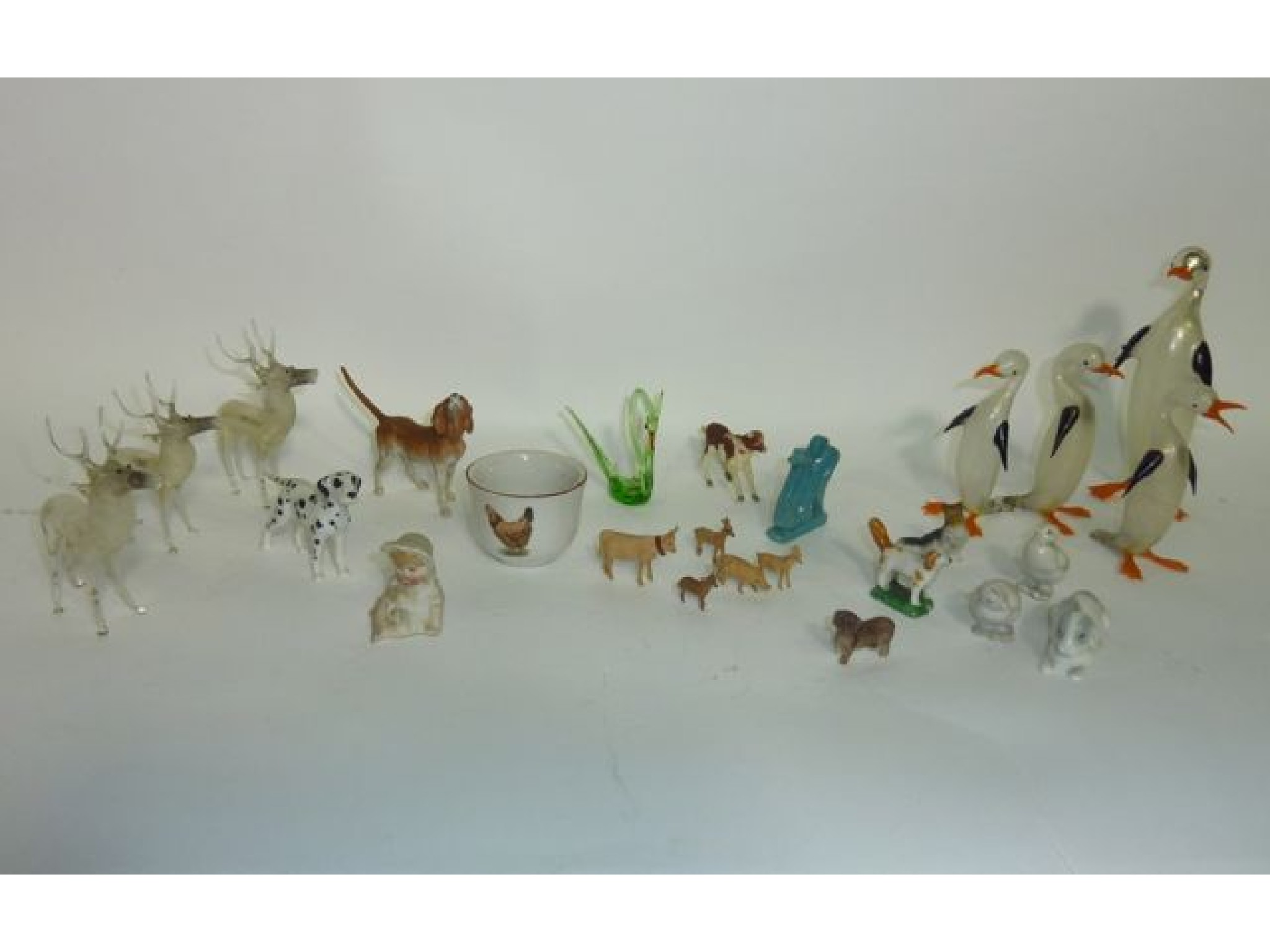 Appraisal: A collection of small ceramic and glass models of animals