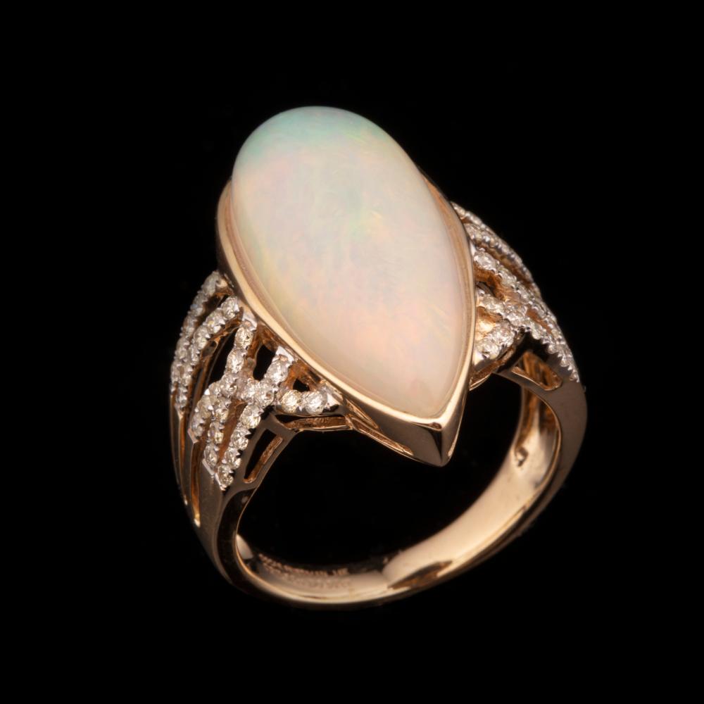 Appraisal: kt Yellow Gold Opal and Diamond Ring center bezel set