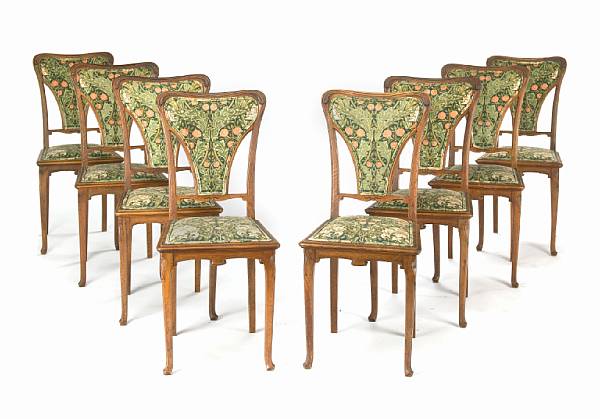 Appraisal: A set of eight Art Nouveau upholstered carved walnut side