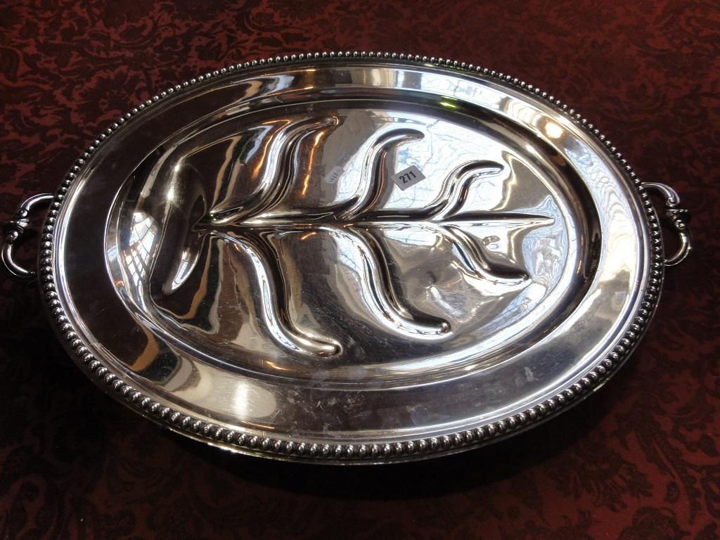 Appraisal: A substantial silver plated two handled oval warming dish with