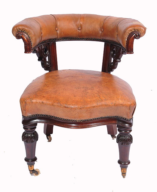 Appraisal: A WILLIAM IV MAHOGANY FRAMED LEATHER UPHOLSTERED LIBRARY ARMCHAIR with